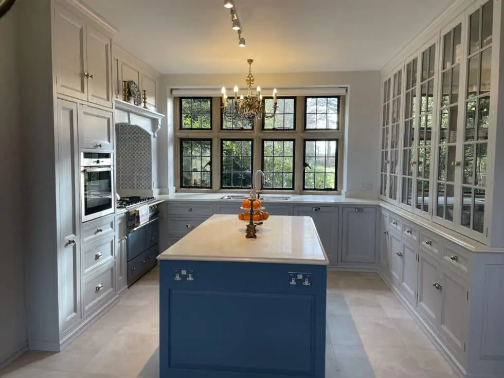 Blue kitchen with stone worktop